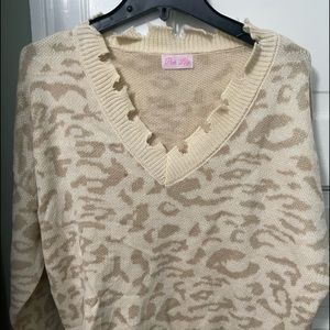 Pink Lilly size large distressed sweater